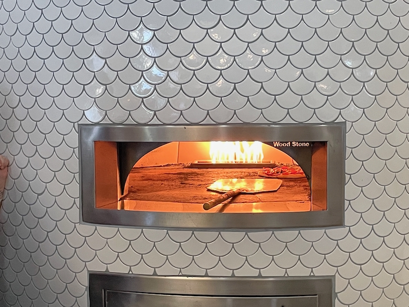 Wood-fired pizza oven at Mallory Hill Country Club Restaurant
