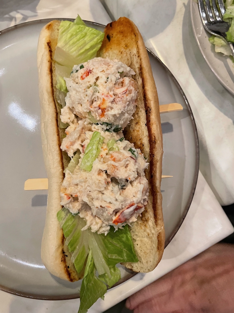 Seafood Roll with lobster, shrimp, and crab on toasted bun
