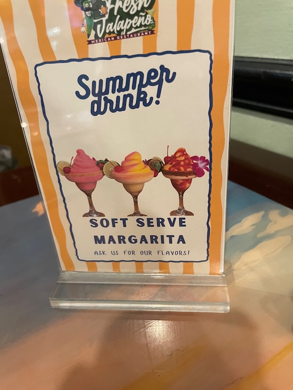 Sign advertising soft-serve margaritas inside the restaurant